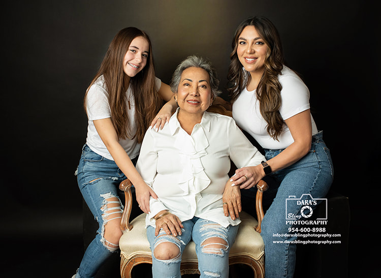 grandmother and granddaughter portrait white shirts jeans