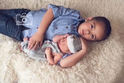 Big brother newborn session Dara's Bling Photography