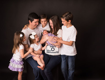 Davie family newborn photography session sisters and brothers