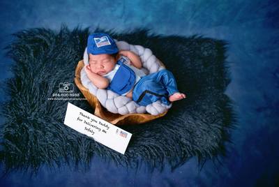 Miami birth photographer newborn baby boy mailman