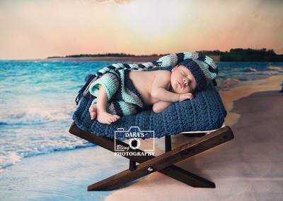 Hallandale birth center birth photographer newborn boy on hammock at beach