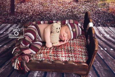 Miami IVF birth photography newborn baby boy with bear on bed
