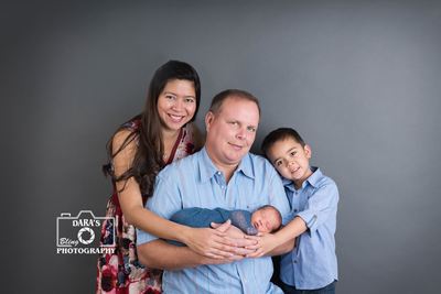 Miami newborn photography session family with newborn baby boy big brother