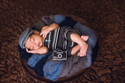 Aventura newborn photographer baby boy on blue bowl