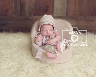Hallandale Birth Center newborn photographer Hallandale beach baby on a chair